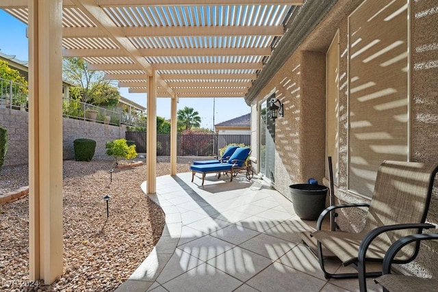 view of patio featuring a pergola