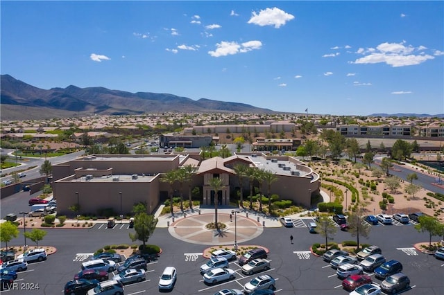 birds eye view of property featuring a mountain view