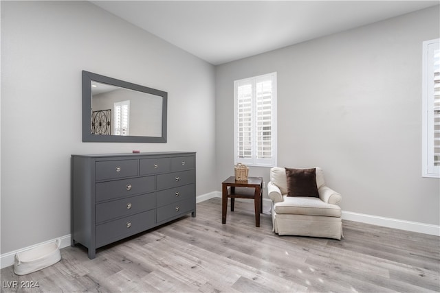 sitting room with light wood-type flooring