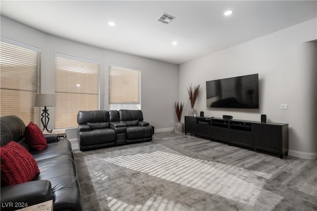 living room with light hardwood / wood-style flooring