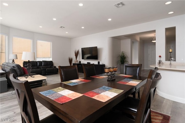 dining area with light wood-type flooring