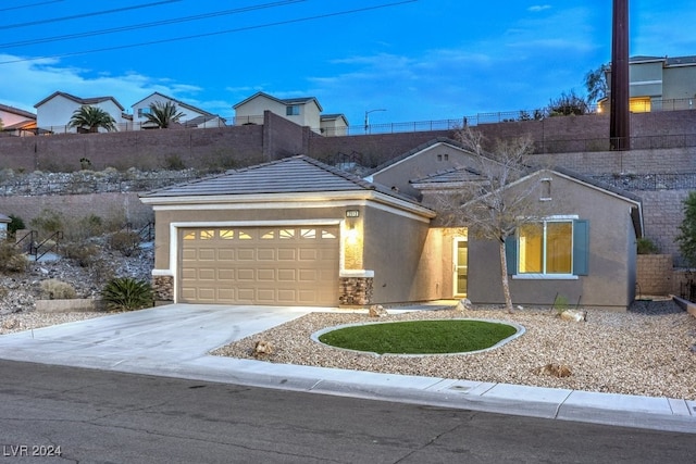 view of front of home with a garage