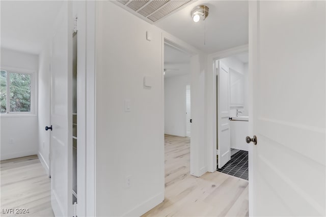 hall featuring light wood-type flooring