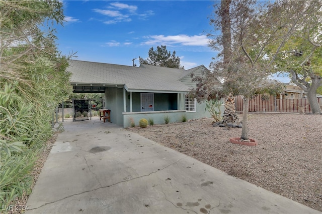 view of front of house featuring a carport