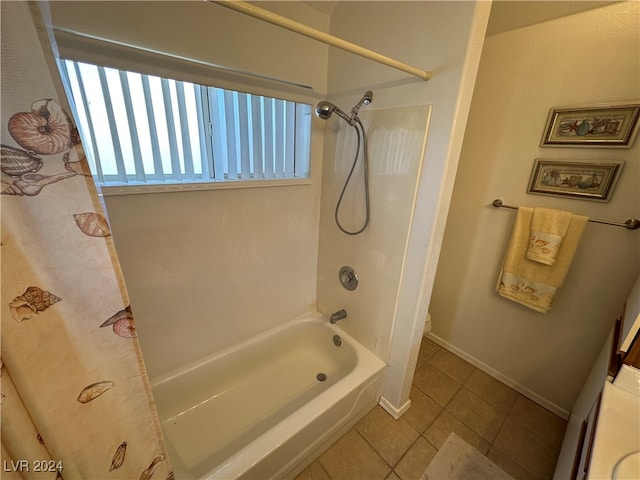 bathroom featuring tile patterned floors and shower / tub combo with curtain