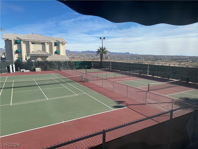 view of sport court with a gazebo and basketball court