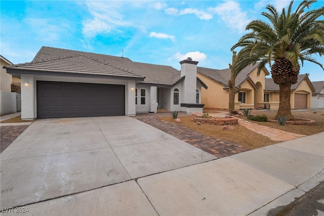 view of front of property featuring a garage