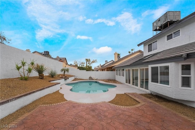 view of swimming pool featuring a patio