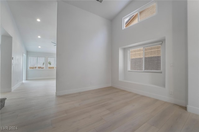 spare room featuring light hardwood / wood-style floors