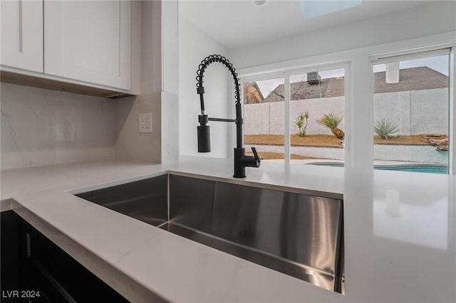 details with sink and white cabinets