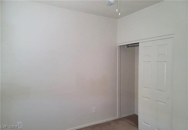 unfurnished bedroom with a closet