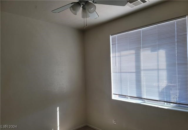 unfurnished room featuring ceiling fan