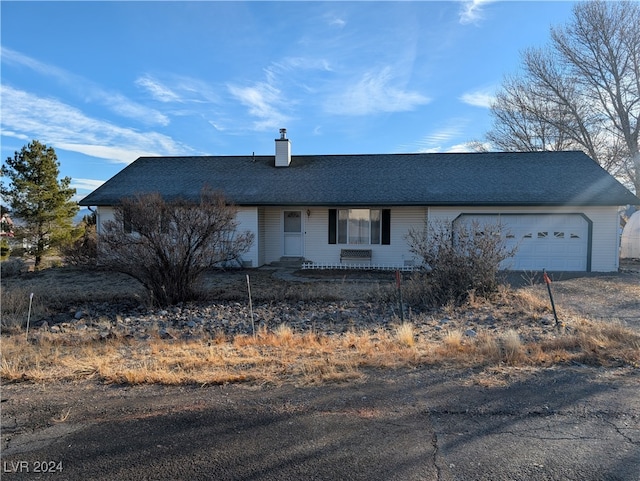 single story home with a garage