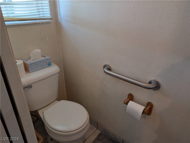 bathroom featuring toilet