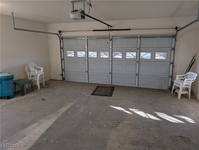 garage featuring a garage door opener