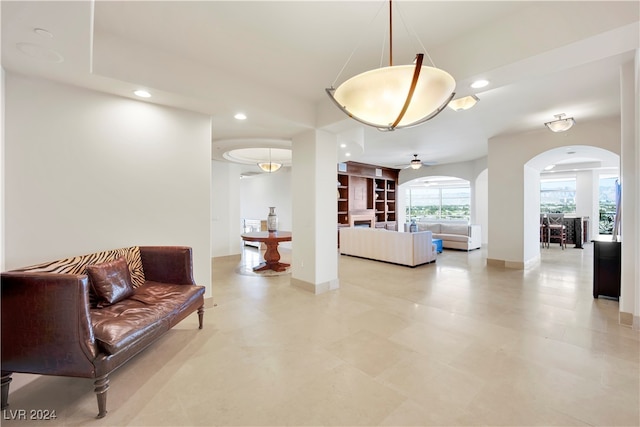 living room with ceiling fan