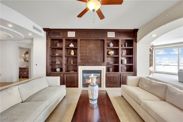 living room featuring ceiling fan