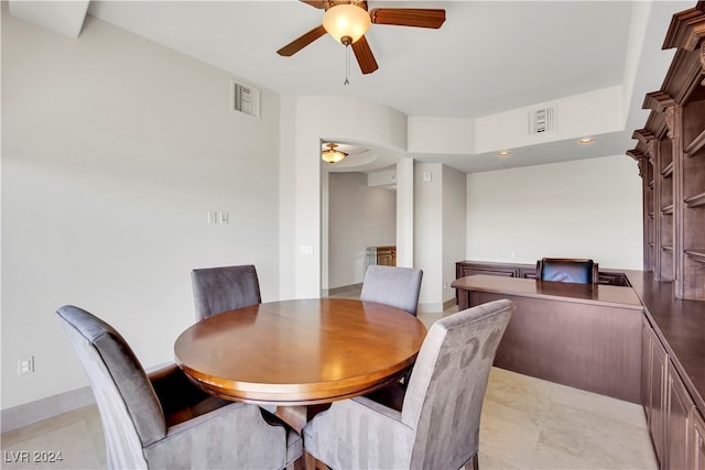 dining room featuring ceiling fan and light tile patterned floors