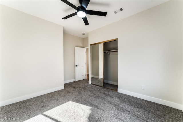 unfurnished bedroom with ceiling fan, a closet, and carpet floors