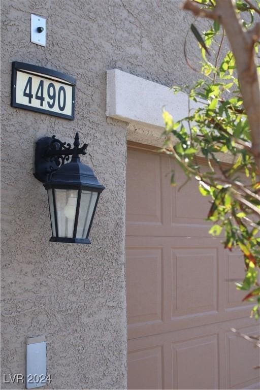 exterior details featuring stucco siding