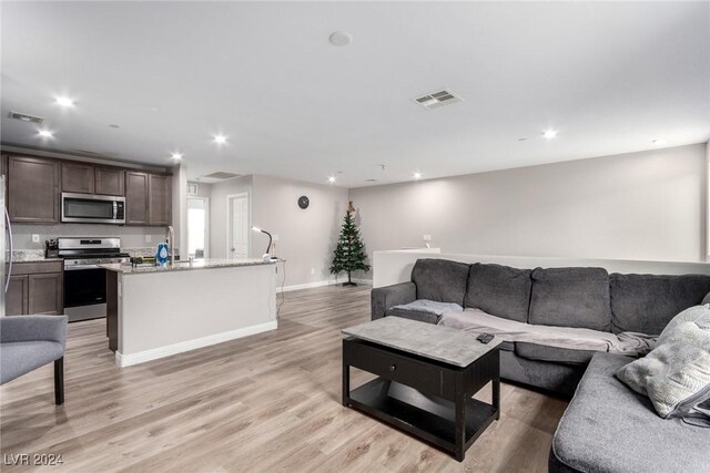 living room with light wood-type flooring