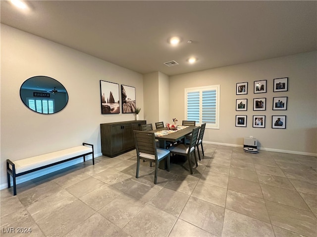 dining area featuring visible vents and baseboards