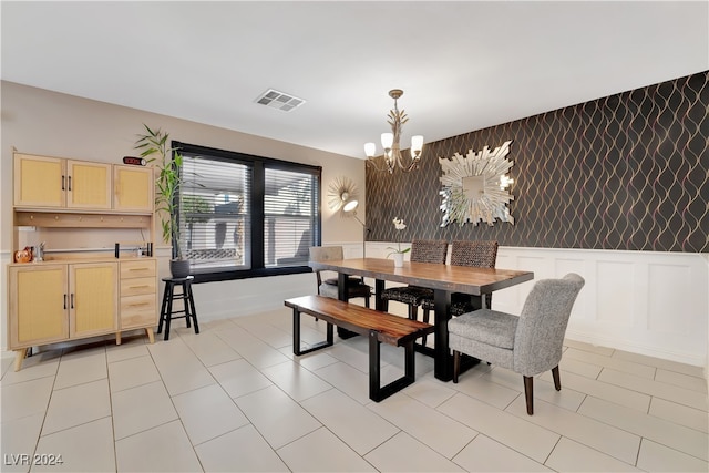 dining room featuring a notable chandelier