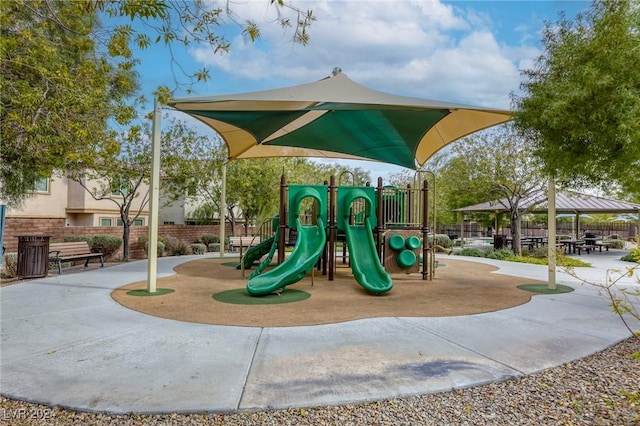 community jungle gym featuring fence