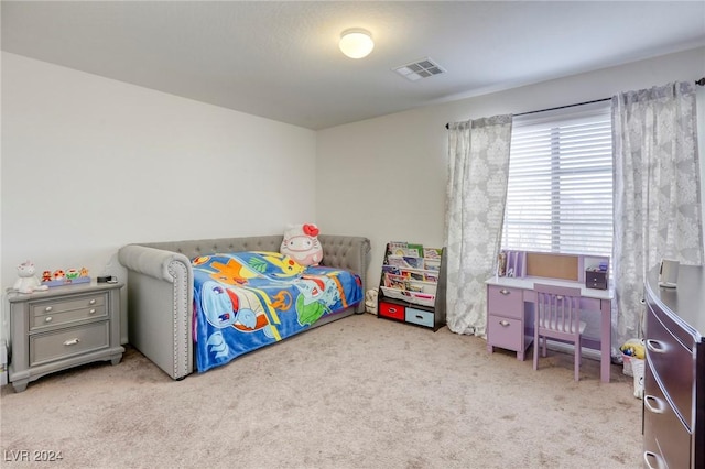 carpeted bedroom with visible vents