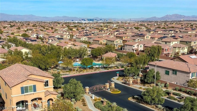 aerial view featuring a mountain view and a residential view