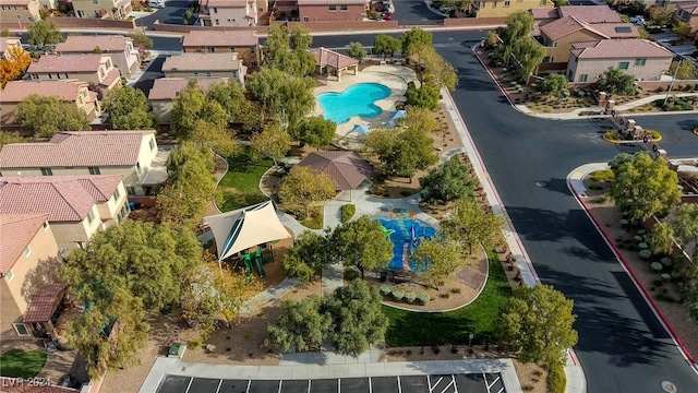 birds eye view of property with a residential view