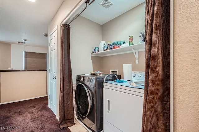 washroom featuring carpet floors and washing machine and clothes dryer