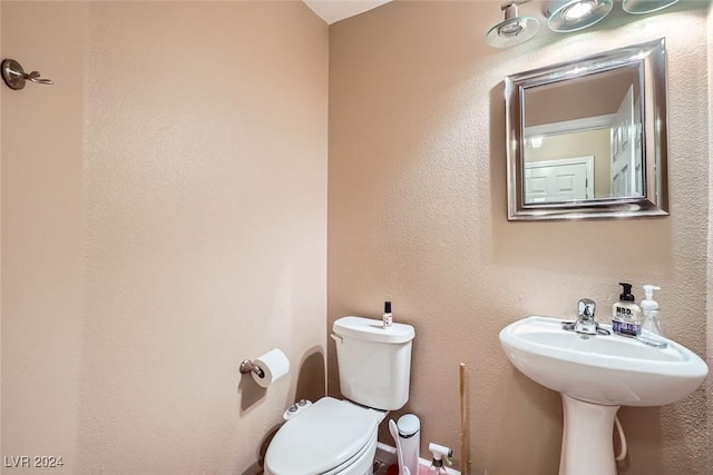 bathroom featuring toilet