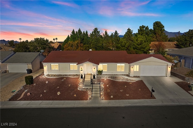 view of front of property with a garage