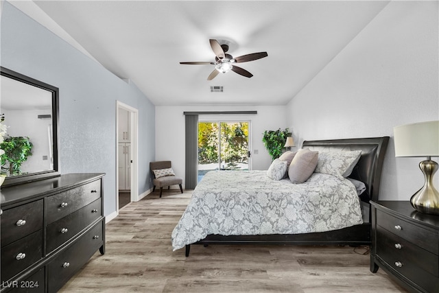 bedroom with access to exterior, light wood-type flooring, ceiling fan, and lofted ceiling