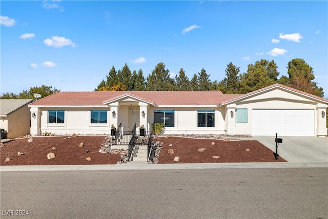 ranch-style home with a garage