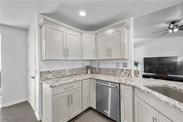 kitchen featuring stainless steel dishwasher, ceiling fan, white cabinets, and light stone countertops