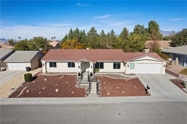 single story home with a garage