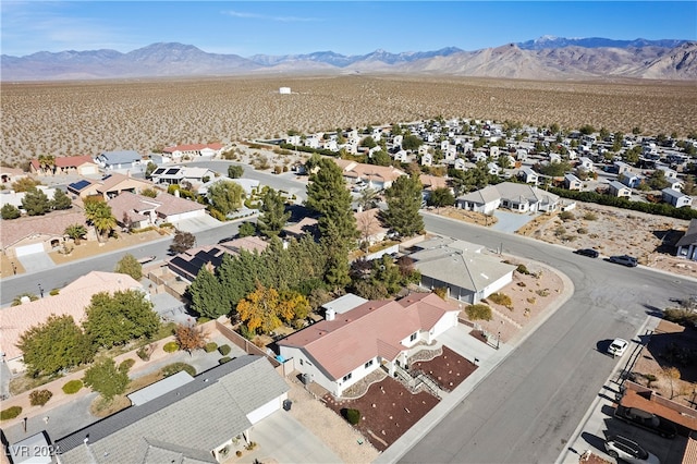 bird's eye view with a mountain view