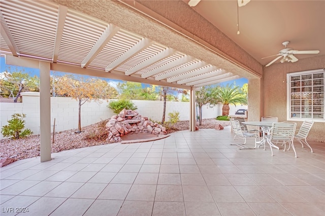 view of patio featuring a pergola and ceiling fan