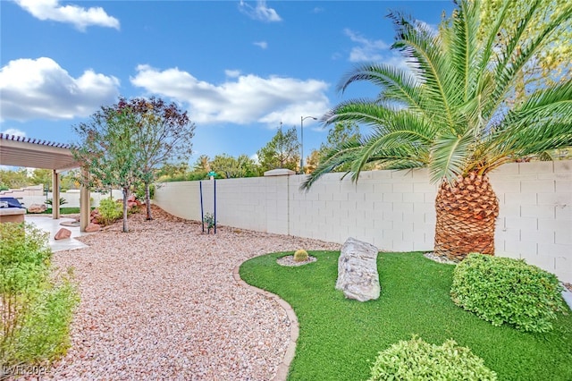 view of yard with a pergola