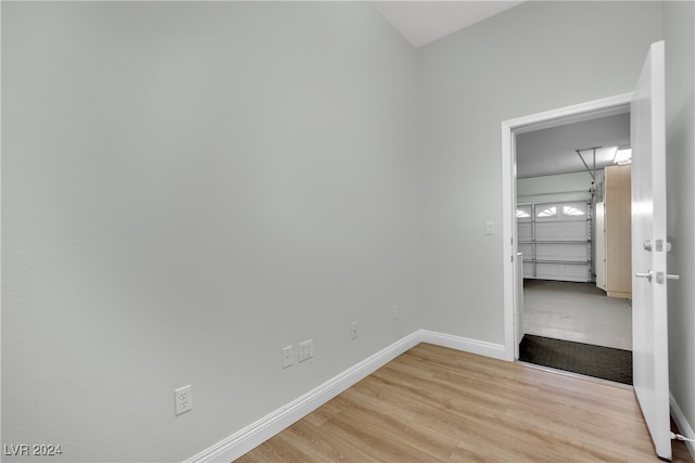 spare room featuring light wood-type flooring