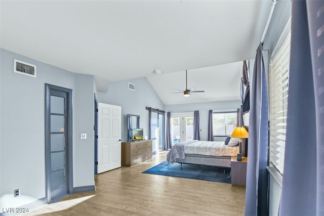 bedroom featuring wood-type flooring, ceiling fan, and lofted ceiling