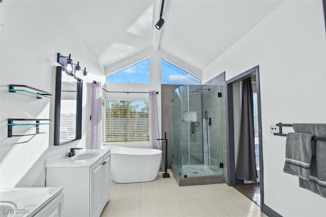 bathroom with vaulted ceiling with beams, independent shower and bath, and vanity