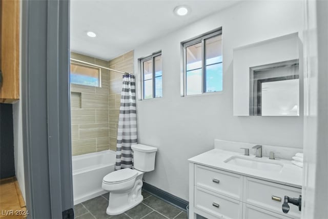 full bathroom with shower / bathtub combination with curtain, tile patterned flooring, vanity, and toilet