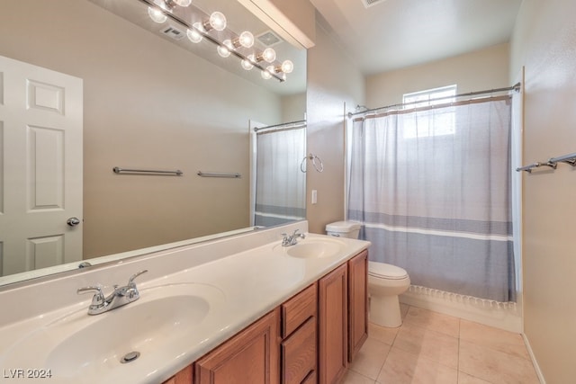 full bathroom with tile patterned flooring, vanity, toilet, and shower / tub combo with curtain