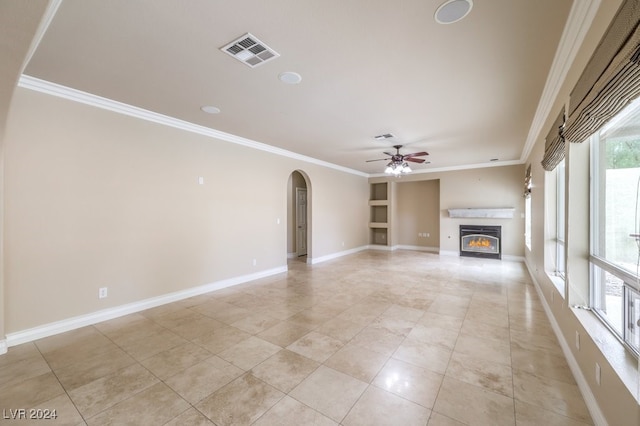 unfurnished living room featuring crown molding, ceiling fan, and light tile patterned flooring