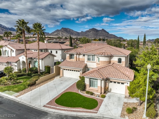 mediterranean / spanish home with a mountain view