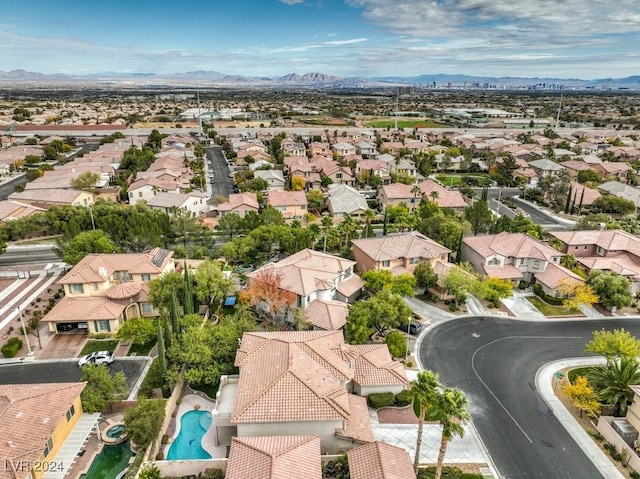 drone / aerial view featuring a mountain view