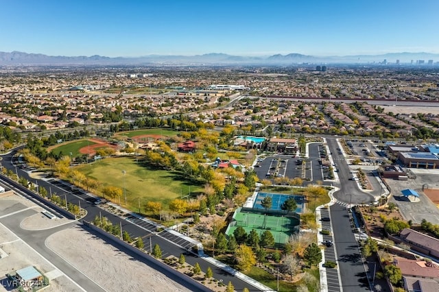 birds eye view of property featuring a mountain view